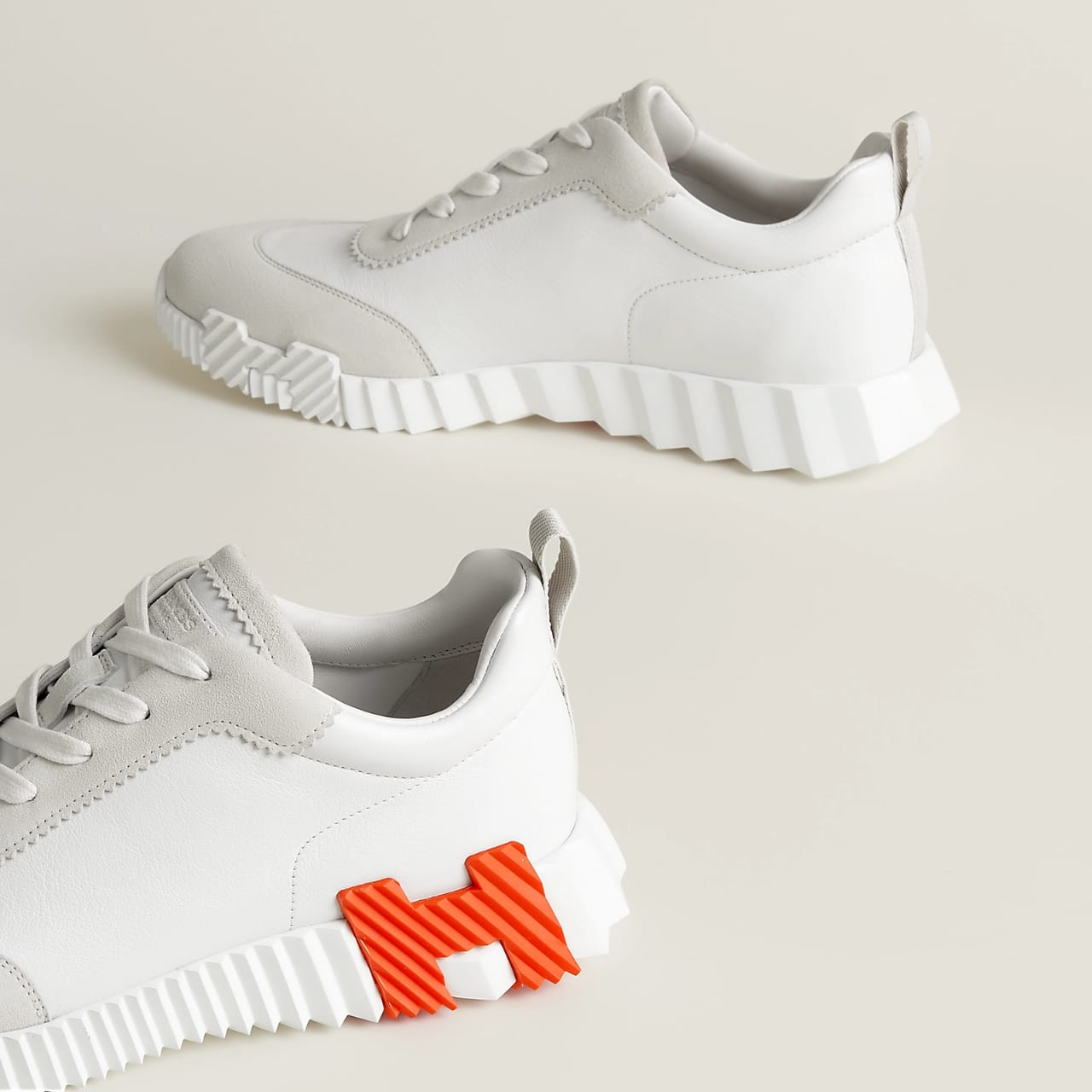 HERMES BOUNCING SNEAKERS IN WHITE ORANGE