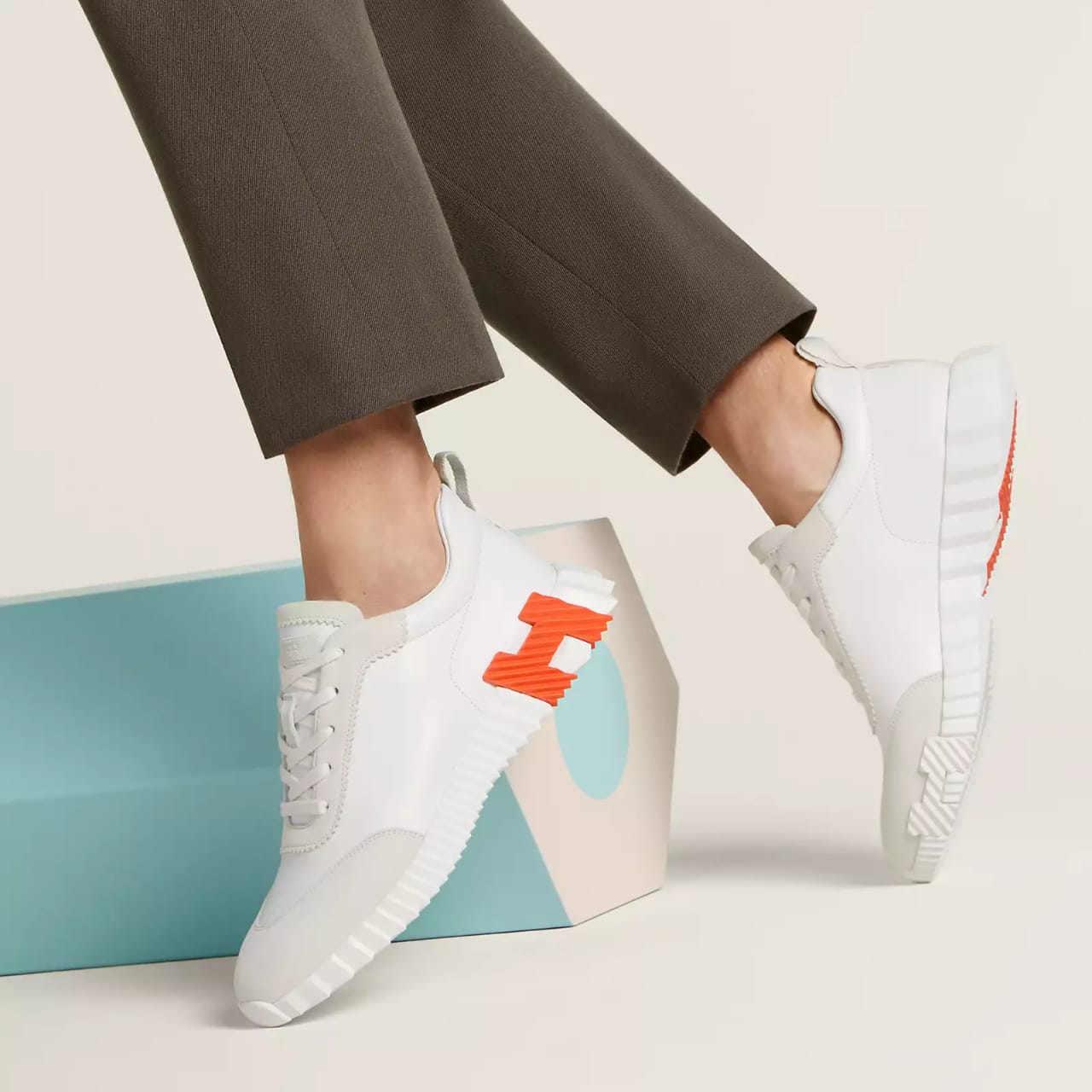 HERMES BOUNCING SNEAKERS IN WHITE ORANGE